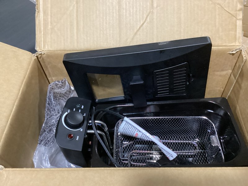 Condition photo showing As Is for amazon basics 3.2-qt (3.0l) deep fryer with 12-cup oil capacity, adjustable temperature, easy draining basket, stainless steel exterior, viewing window, 1500w, black & silver 3.2-qt, black & silver