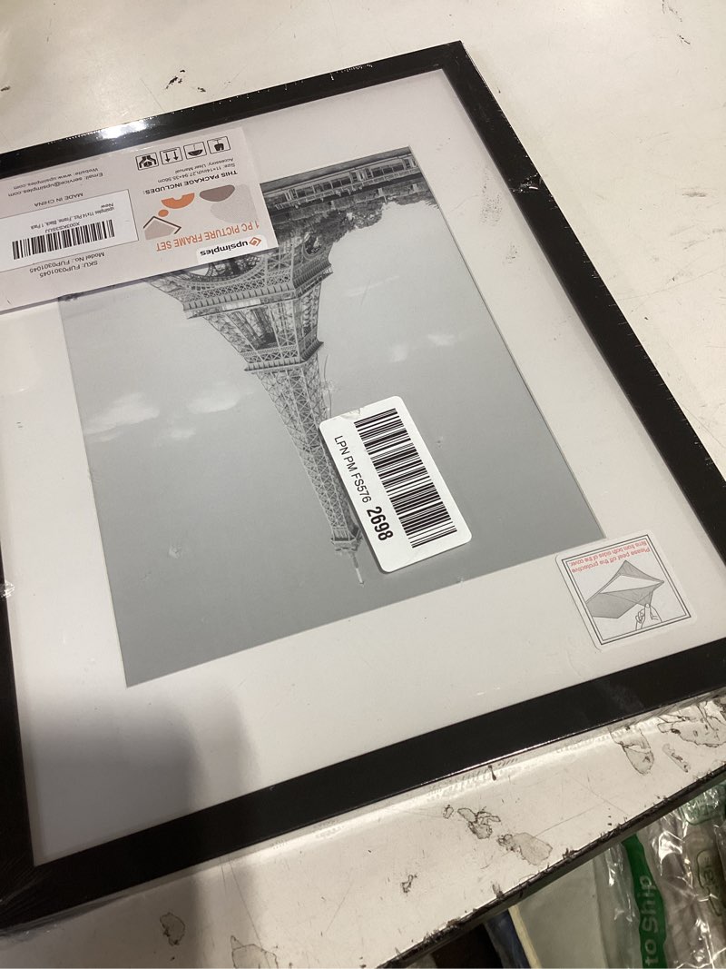 Condition photo showing New/Like New for upsimples 11x14 picture frame, display pictures 8x10 with mat or 11x14 without mat, wall hanging photo frame, black, 1 pack black 11x14