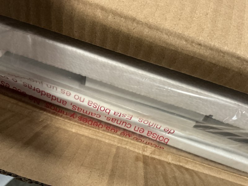 Condition photo showing New/Like New for regalo safety 36" extra tall baby gate for doorways & bottom of stairs, pressure mounted walk through gate for babies, toddlers & pets, tested & safe for 30 years, american designed, american owned white 29-36.5"w x 36"h