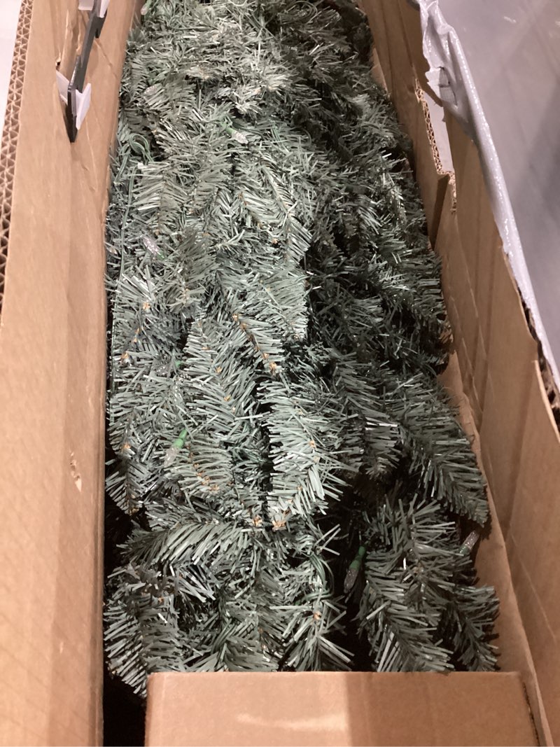 Condition photo showing As Is for 6.5FT Pre-lit Artificial Christmas Tree with 813 Branch Tips, 250 Dual-Color LED Lights and Metal Stand, Realistic Blue Spruce Tree for Holiday Décor Blue Spruce With Multicolored Lights 6ft 6in