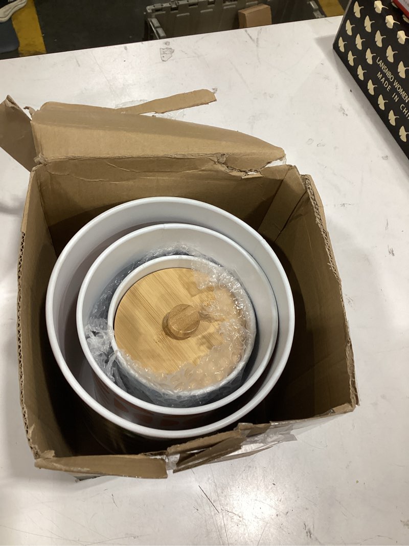 Condition photo showing Good Condition for kitchen canisters for countertop set of 4, patterned iron w/ airtight lids | airtight easy open bamboo lids - dent-resistant thick metal - sturdy comfortable bamboo handles - unique printed pattern