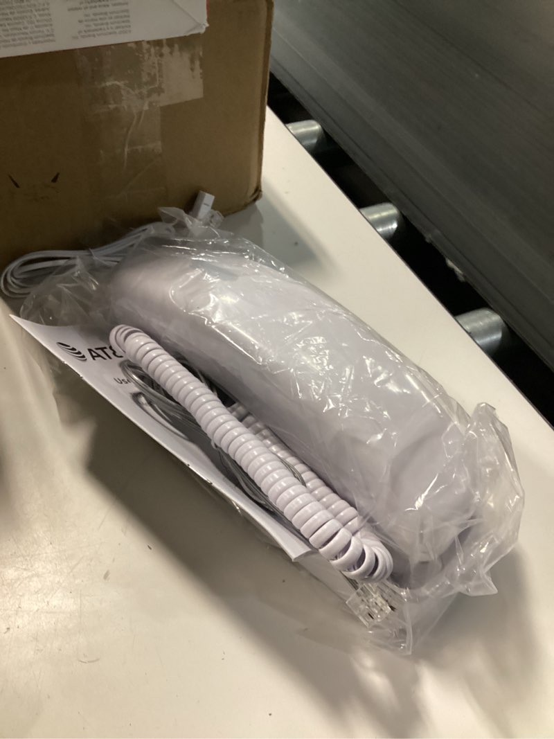 Condition photo showing Good Condition for at&t trimline 213 corded phone with extra big buttons - senior friendly white landline phone, visual ringer, lighted keypad, wall mount, no ac power needed