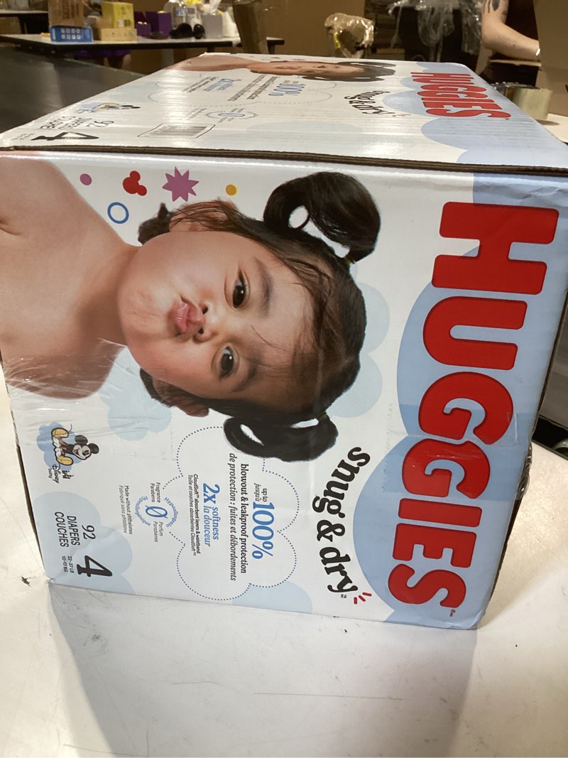 Condition photo showing New/Like New for huggies size 4 diapers, snug & dry baby diapers, size 4 (22-37 lbs), 92 count, packaging may vary size 4 92