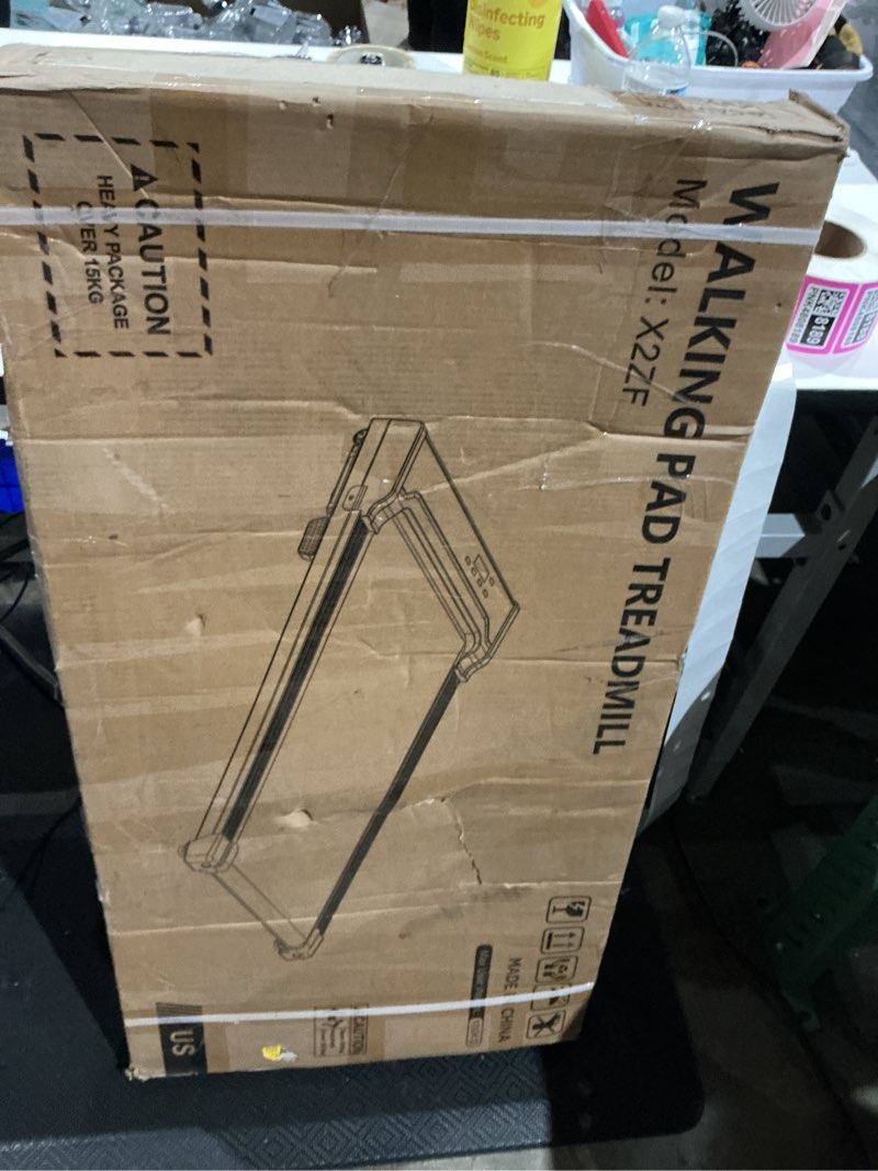 Condition photo showing As Is for walking pad treadmill for home - under desk walking and running with remote control portable electric machine adjustable slim compact with 0.6-4.0mph modes max up 265 lbs for home office