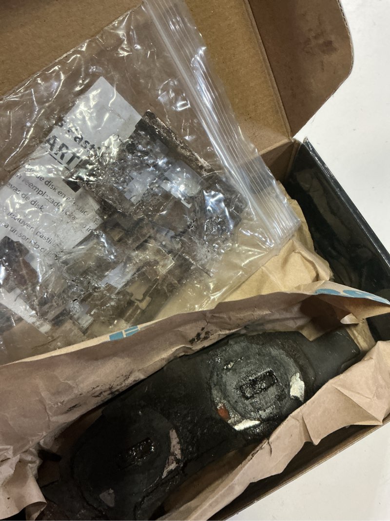 Condition photo showing As Is for bendix premium sbc1169 ceramic front brake pads for select models buick rainier, chevrolet colorado, trailblazer, trailblazer ext, gmc canyon, envoy, envoy xl, isuzu ascender, saab 9-7x