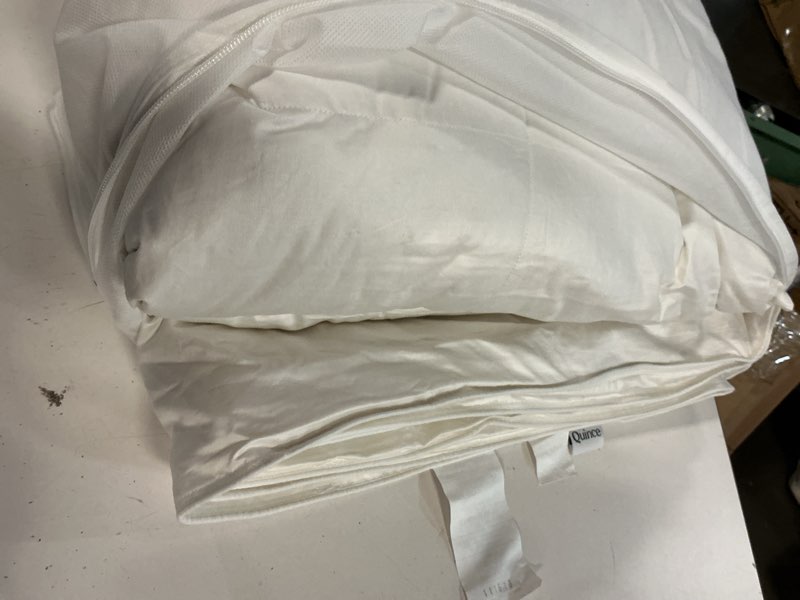 Condition photo showing New/Like New for premium down comforter king 