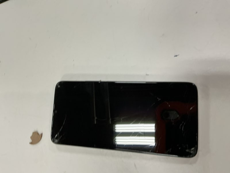 Condition photo showing As Is for @ boost mobile tcl k33 5g, 64gb, black prepaid smart phone, locked to boost  ***working condition verified. no network or connectivity tests were performed. bidder be advised ***