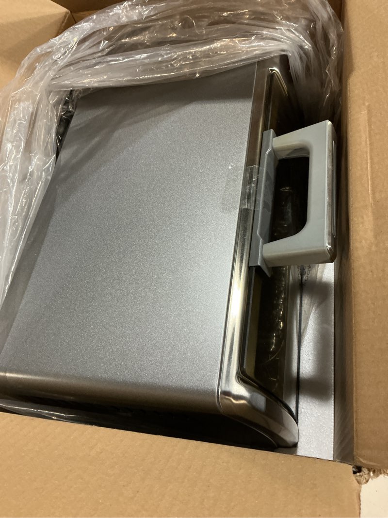 Condition photo showing Good Condition for black+decker crisp 'n bake air fry countertop convection toaster oven, medium capacity, 4-slice, 5-in-1, fits 9” pizza, 30-min timer, bake, broil, air fry, toast, keep warm, stainless steel
