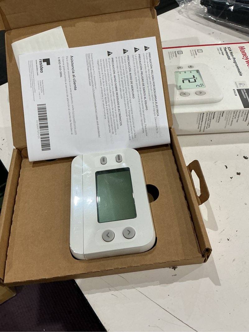 Condition photo showing As Is for honeywell home x1n heating and cooling push button non-programmable thermostat