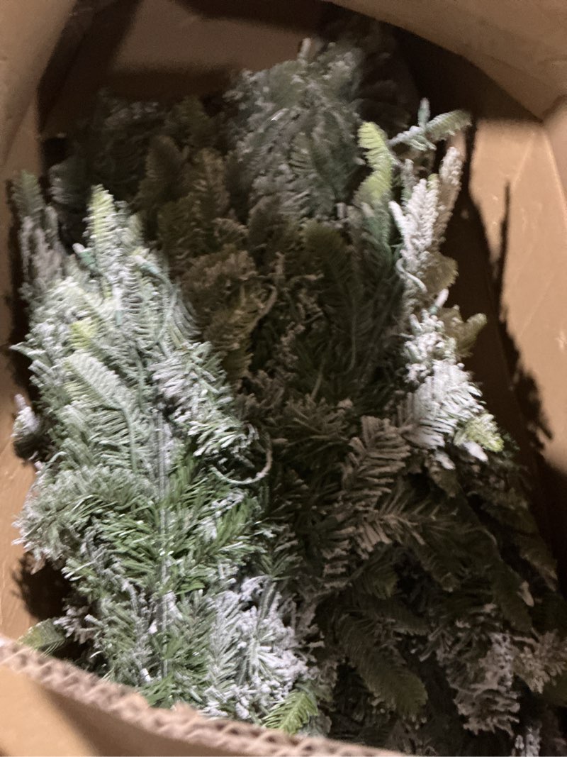 Condition photo showing As Is for Puleo International 7.5ft Pre-Lit Flocked Aspen Fir Artificial Christmas Tree with 700 Clear Lights, 1319 Realistic Dense Branch Tips, Easy Setup Artificial Trees with Sturdy Metal Stand 7.5' Flocked Aspen Fir with 700 Clear Lights