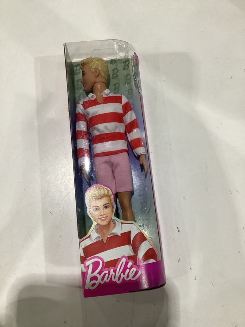 Condition photo showing Good Condition for barbie fashionistas ken doll #241 with blonde hair wearing red and white striped polo shirt with pink shorts, white crew socks and sneakers