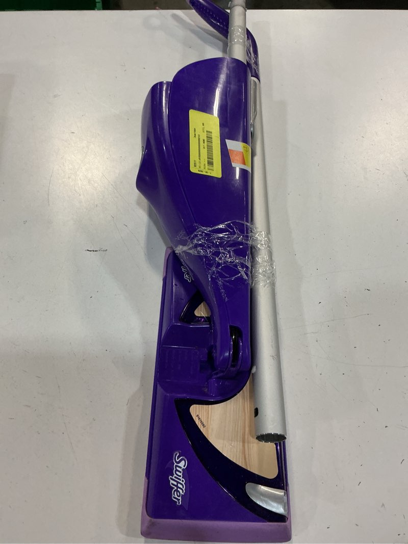 Condition photo showing As Is for swiffer wetjet wood floor spray mop starter kit, 1 power mop, 5 mopping pads, 1 floor cleaner liquid solution, 7 piece set