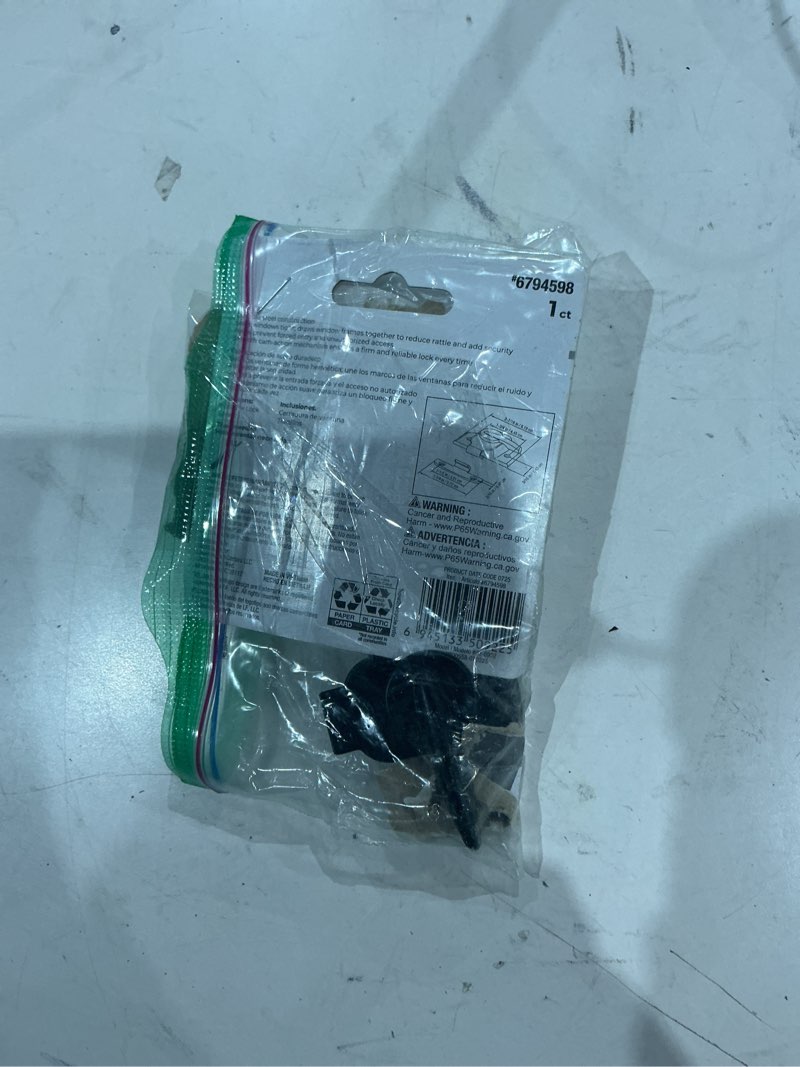 Condition photo showing As Is for reliabilt 2-in black die-cast sliding window sash lock