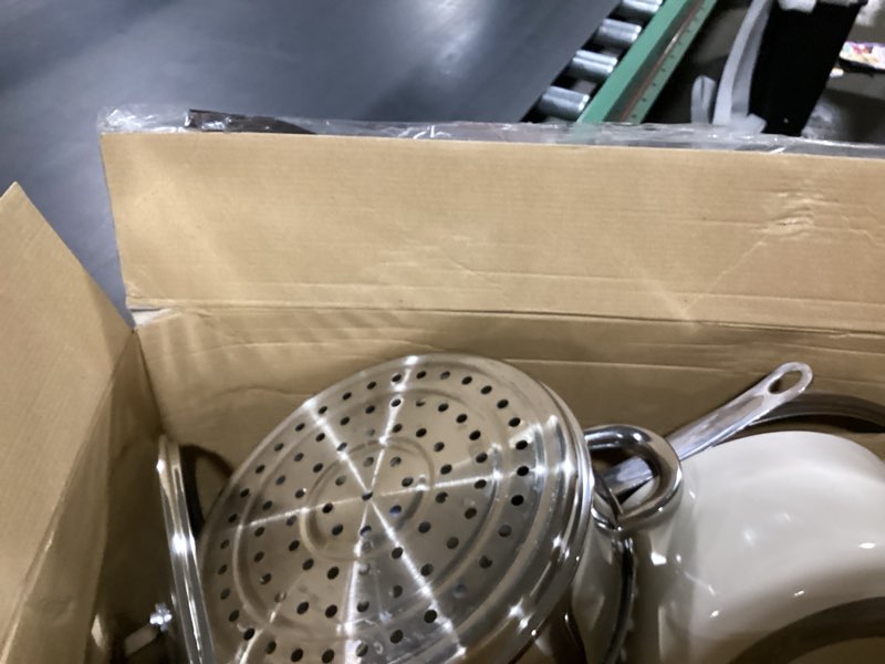 Condition photo showing As Is for Gotham Steel 12 Pc Ceramic Cookware Set Nonstick, Ceramic Pots and Pans Set Non Stick with Steamer for Cooking, Non Toxic PFOA PFOS Free, Premium Stay Cool Handles, Oven & Dishwasher Safe 12 Pc Set Cream White