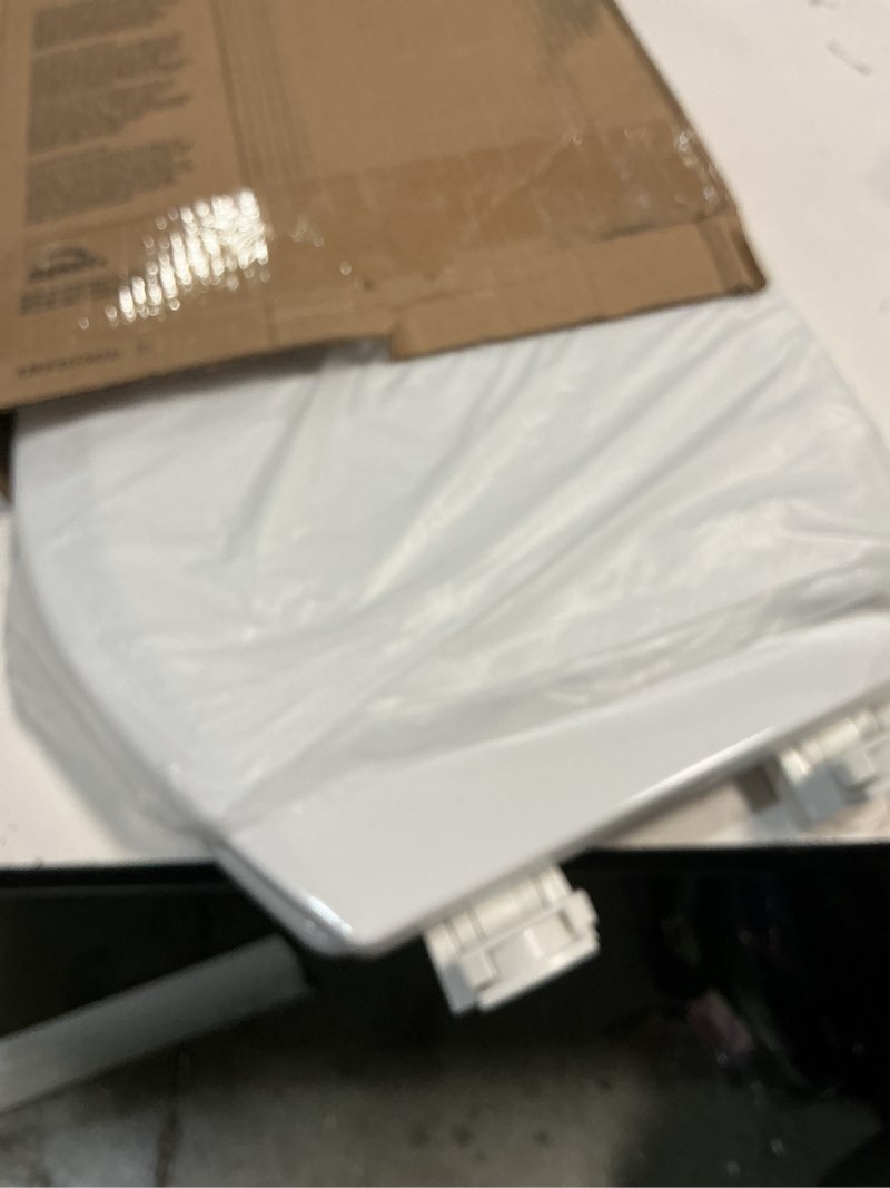 Condition photo showing New/Like New for bemis round enameled wood toilet seat in cotton white with easy•clean hinge