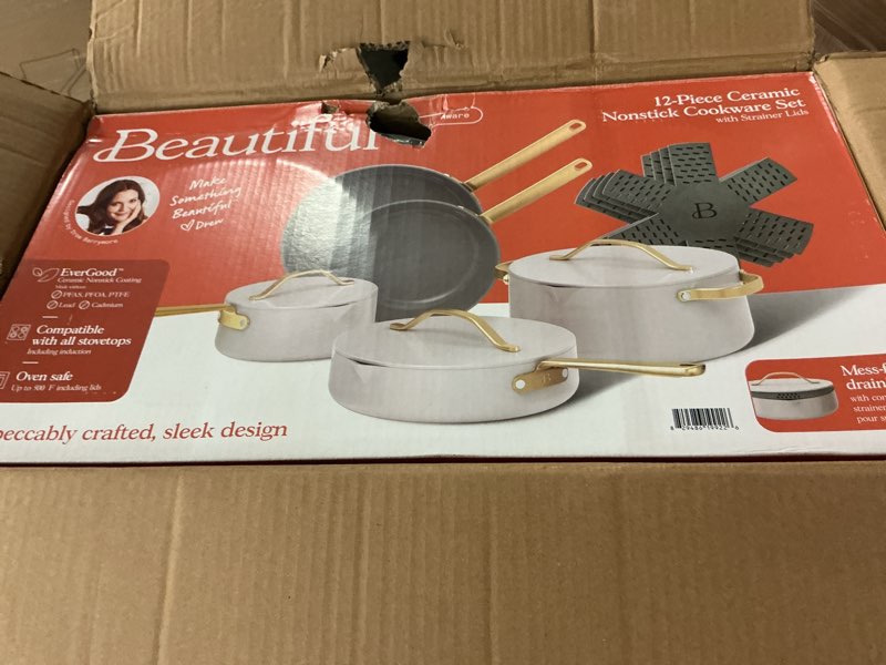 Condition photo showing New/Like New for beautiful 12-piece ceramic nonstick cookware set  pots and pans with strainer lids  porcini taupe by drew barrymore