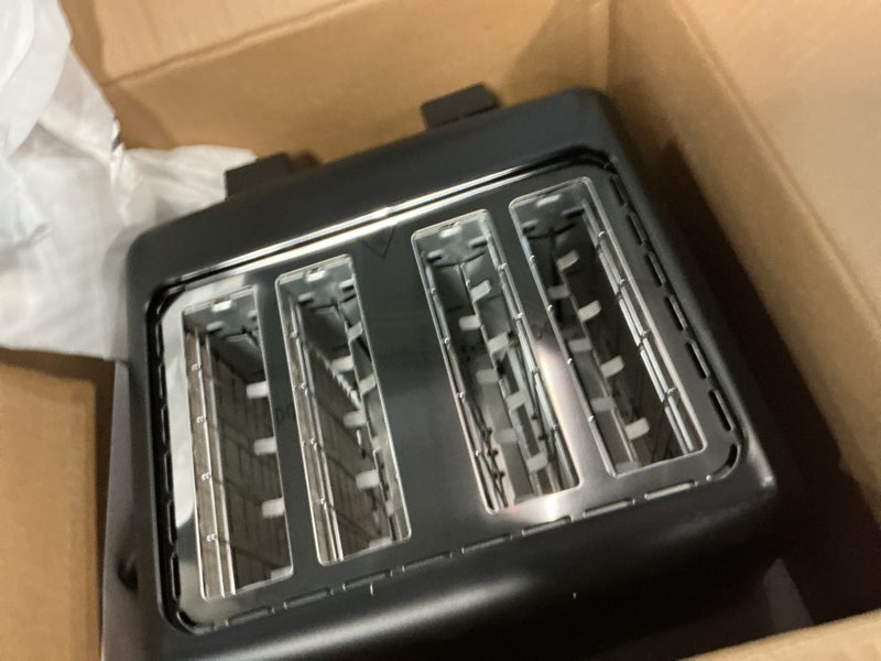 Condition photo showing Good Condition for Amazon Basics 4 Slice Toaster, With 7 Browning Settings, Extra Wide Slots For Bagels and Special Breads, Removable Easy-to-Clean Crumb Trays, Cancel/Defrost/Bagel Buttons, 1500W, Black & Silver