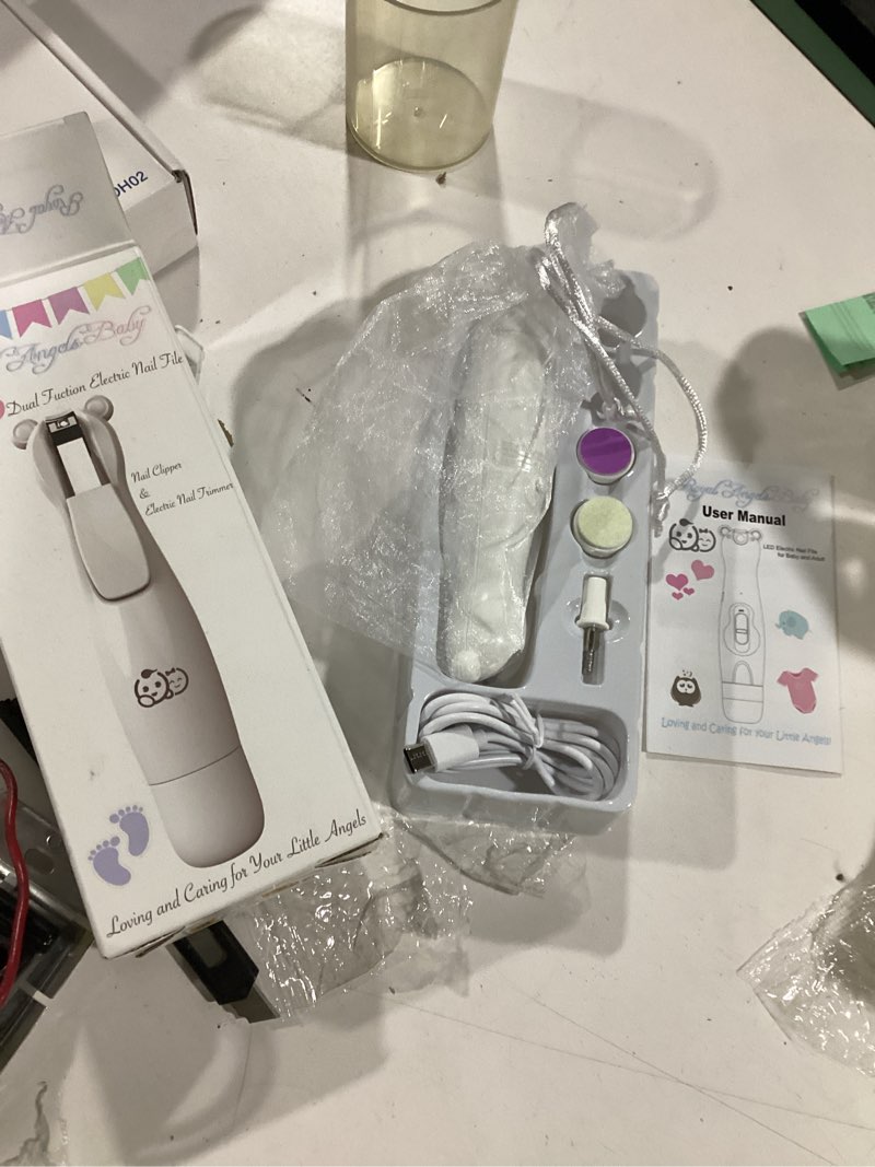 Condition photo showing New/Like New for royal angels rechargeable dual sided 20 in 1 baby nail trimmer & clipper, 15 filing pads, whisper quiet electric file with led lights for newborns & toddlers, safe manicure set for families (snow) snow 20 piece set
