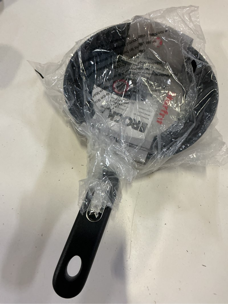 Condition photo showing New/Like New for starfrit the rock 24 cm (9.5") non-stick fry pan - durable forged aluminum - oven safe - pfoa free - easy to clean - black 9.5 inches 9.5" fry pan