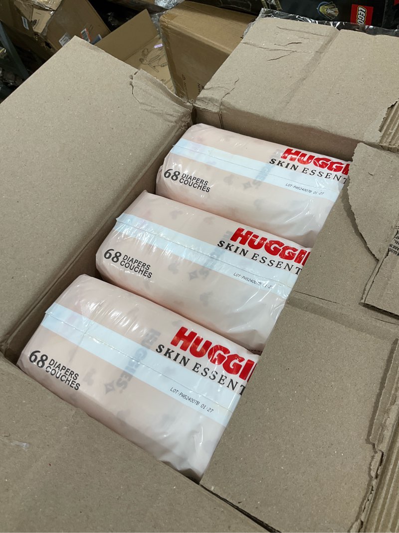 Condition photo showing New/Like New for Huggies Size 1 Diapers, Skin Essentials Baby Diapers, Size 1 (8-14 lbs), 84 Count, Packaging May Vary Size 1 84