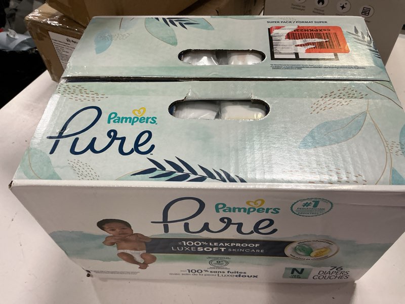 Condition photo showing New/Like New for pampers pure protection baby diapers, size 0 (>10 lbs), 76 count, up to 100% leakproof, premium plant-based skin protection, hypoallergenic soft diapers newborn 76