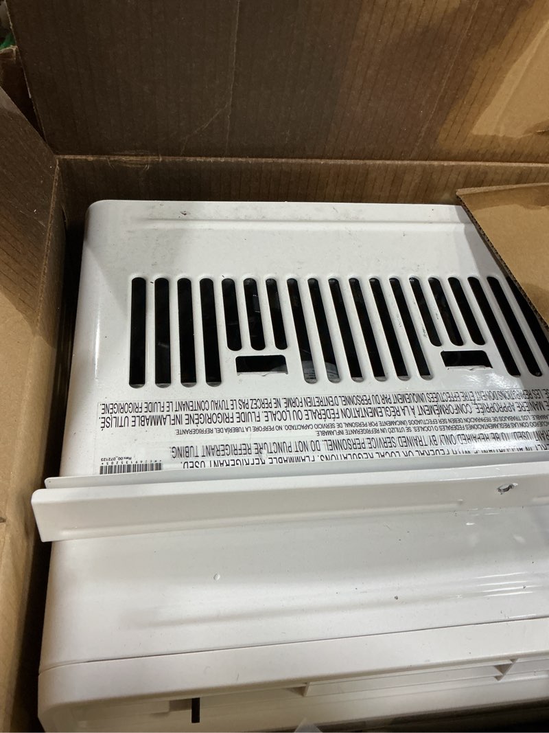 Condition photo showing As Is for lg 5000 btu window air conditioner with remote, easy button control ultra-quiet compact-size cools 150 sq.ft. for small room, washable filter ac unit easy installation white lw5025r