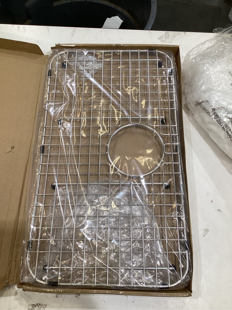 Condition photo showing Good Condition for stainless steel sink grid and protectors for bottom of kitchen sink?26" x 14" inches with rear drain