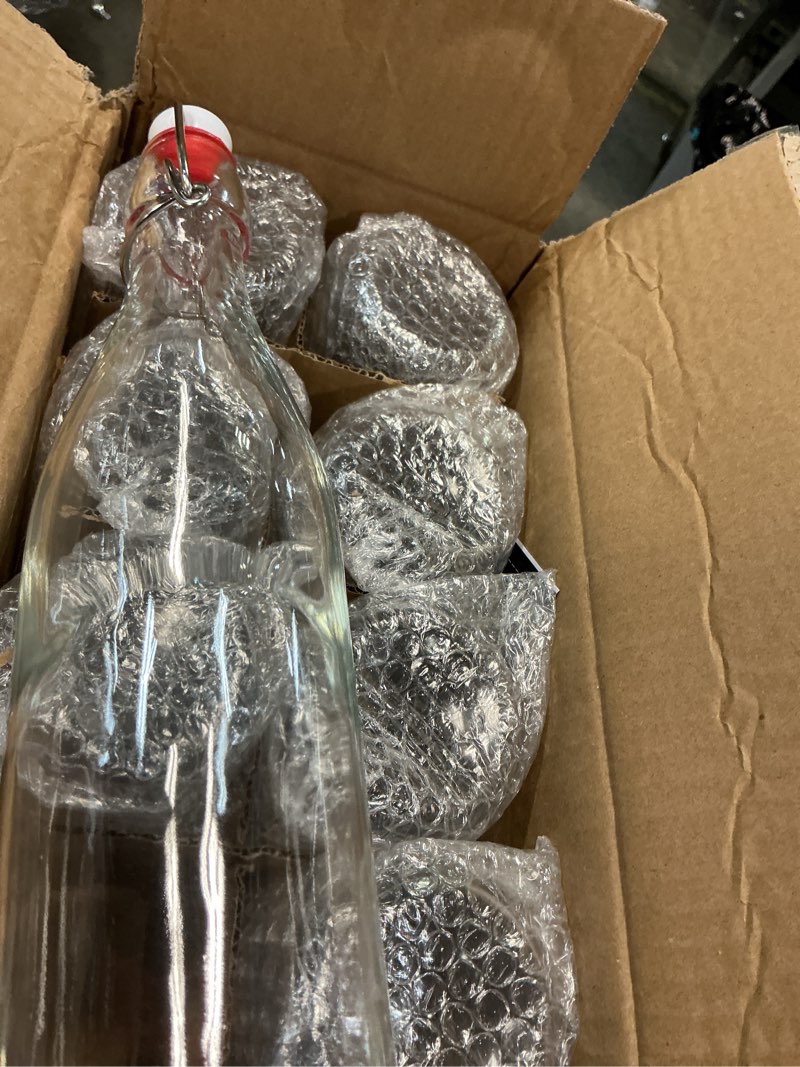 Condition photo showing Good Condition for 8 Set 16 OZ Swing Top Glass Bottles - Flip Top Beer Brewing Bottles with Stopper for Fermentation, Kombucha, Mead Kefir, Vanilla Extract, Juice, Tea, Wine, Soda - Airtight Cap Lids, Bonus 2 Pourers 16OZ