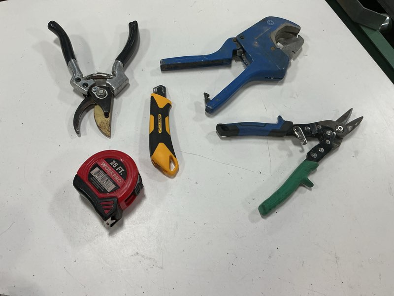 Condition photo showing As Is for assorted home improvement lot (small tools, screw, home accessories, etc.)