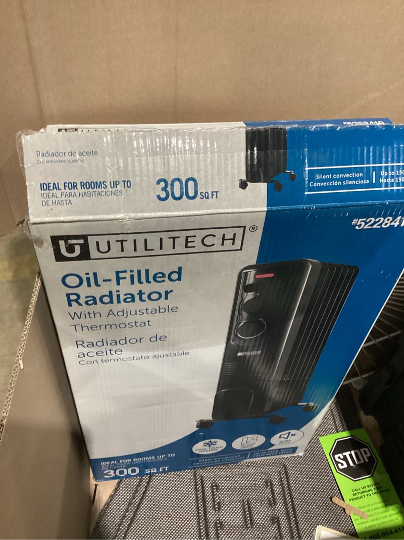 Condition photo showing As Is for Utilitech 1500 -Watt Oil-filled radiant Utility Indoor Electric Space Heater with Thermostat