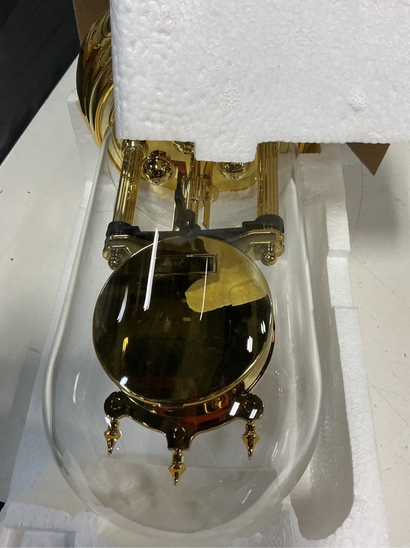 Condition photo showing Good Condition for seiko 9" anniversary mantel clock with glass dome & rotating pendulum