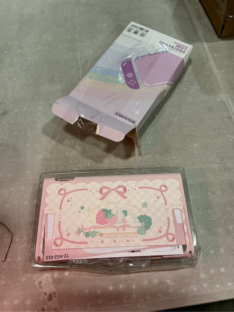 Condition photo showing Good Condition for geekshare strawberries with cream case compatible with switch 2, slim separable soft silicone protective shell with 2 thumb grip caps -- pink pink strawberries for switch 2