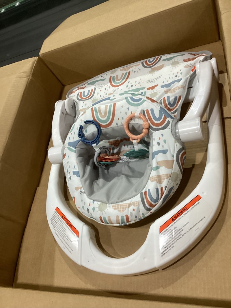 Condition photo showing Good Condition for Fisher-Price Portable Baby Chair Sit-Me-Up Floor Seat with Developmental Toys & Machine Washable Seat Pad, Rainbow Showers 1 Count Rainbow Showers