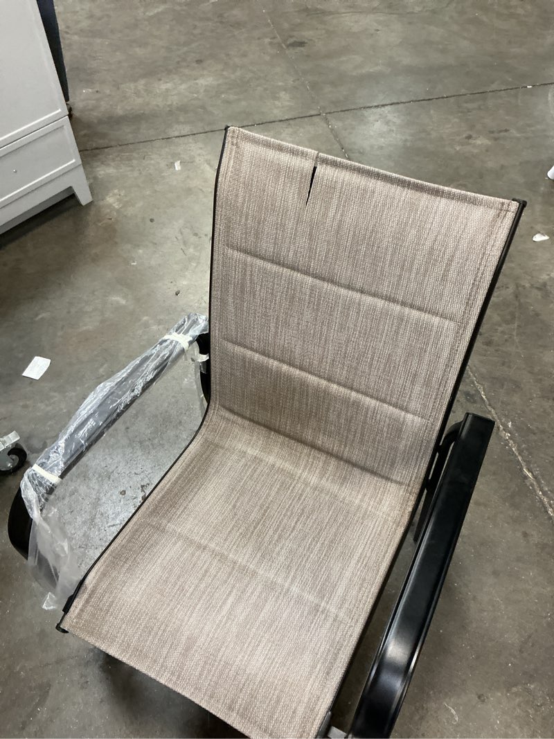 Condition photo showing As Is for style selections pelham woven stackable black metal frame stationary dining chair with tan sling seat
