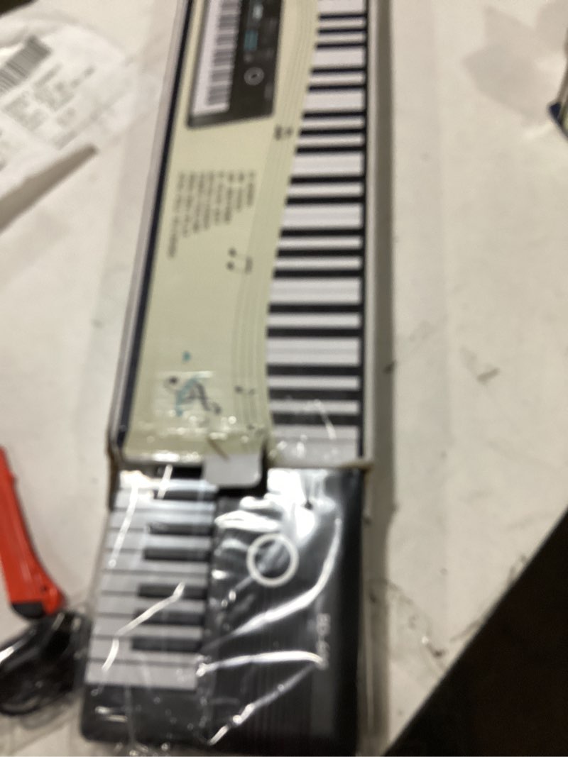 Condition photo showing New/Like New for 61 keys piano keyboard, Electronic Digital Piano with Built-In Speaker Microphone, Portable Keyboard Gift Teaching for Beginners, electric piano for kids, Birthday Gift for Children