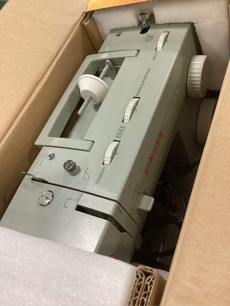 Condition photo showing As Is for SINGER Heavy Duty 4452 High-Speed Sewing Machine with Accessory Kit | Strong Motor with Enhanced Piercing Power, 110 Stitch Applications, Full Metal Frame, 1-Step Buttonhole & LED Lights, Grey