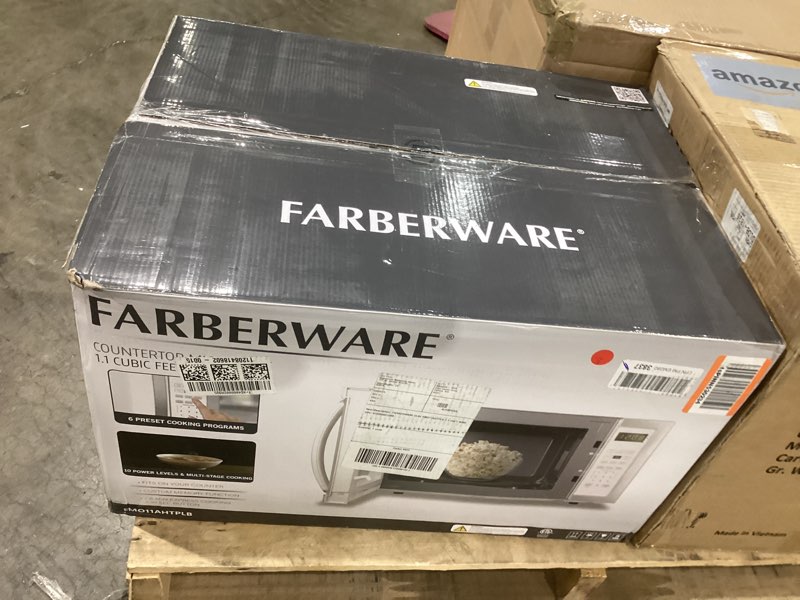 Condition photo showing As Is for Farberware 1.1 Cu. Ft. Countertop Microwave Oven – 1000 Watts Power, Auto Cook Settings, Defrost, Easy Clean and Child Safety Lock - White Platinum 1.1 Cu. Ft. White Platinum