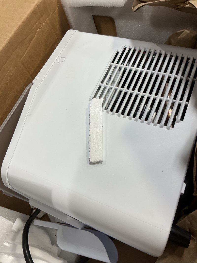 Condition photo showing As Is for Igloo Self-Cleaning Countertop Ice Maker - Compact and Portable - Creates 26 lbs. Per Day, 8 Pieces Ready Every 7-8 Minutes - Includes Ice Scoop and Basket - White White 26 Lb