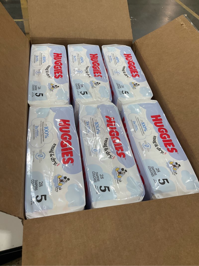 Condition photo showing New/Like New for Huggies Size 5 Diapers, Snug & Dry Baby Diapers, Size 5 (27+ lbs), 168 Count (6 Packs of 28), Packaging May Vary Size 5 168