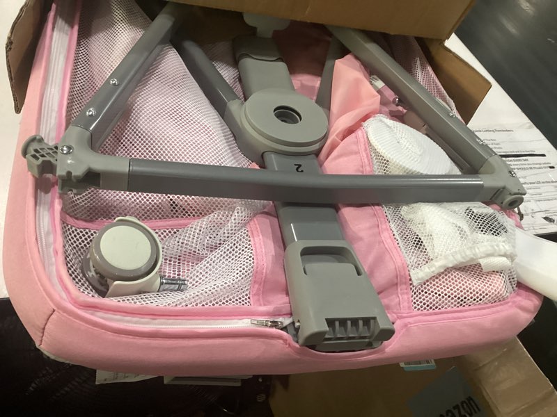 Condition photo showing Good Condition for pink bassinet for baby girl, baby bassinets bedside sleeper with mattress and wheels for newborn and infant, height adjustable with breathable mesh and mosquito net