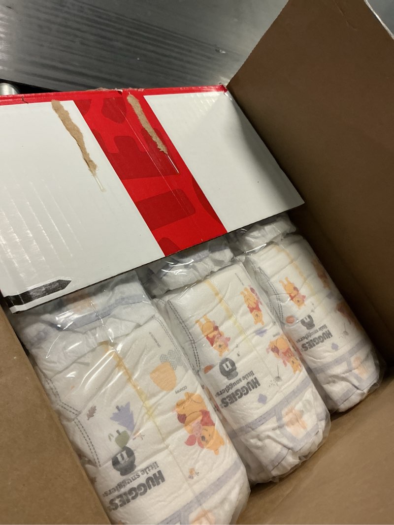 Condition photo showing Good Condition for huggies size newborn diapers, little snugglers baby diapers, size newborn (up to 10 lbs), 144 count, packaging may vary newborn 144