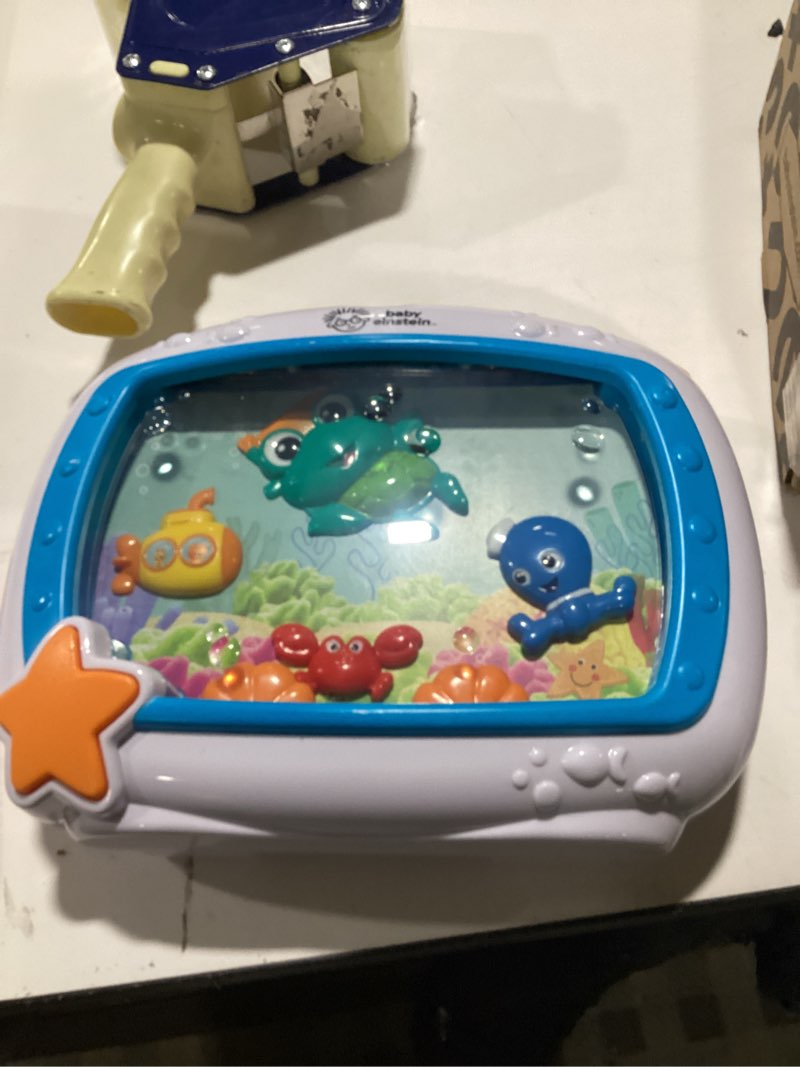 Condition photo showing As Is for Baby Einstein Sea Dreams Soother Musical Crib Toy and Sound Machine, Newborn and up Neutral