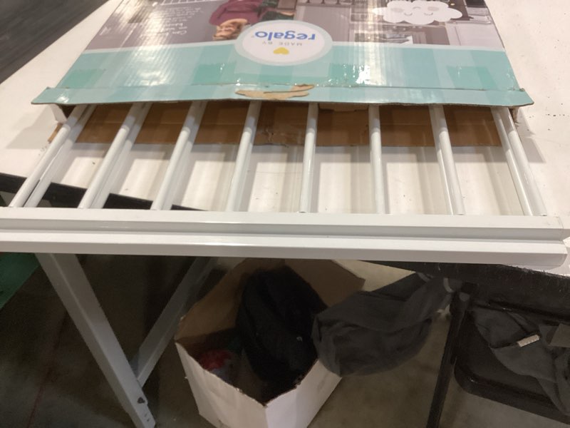 Condition photo showing As Is for regalo top of stair baby gate in white