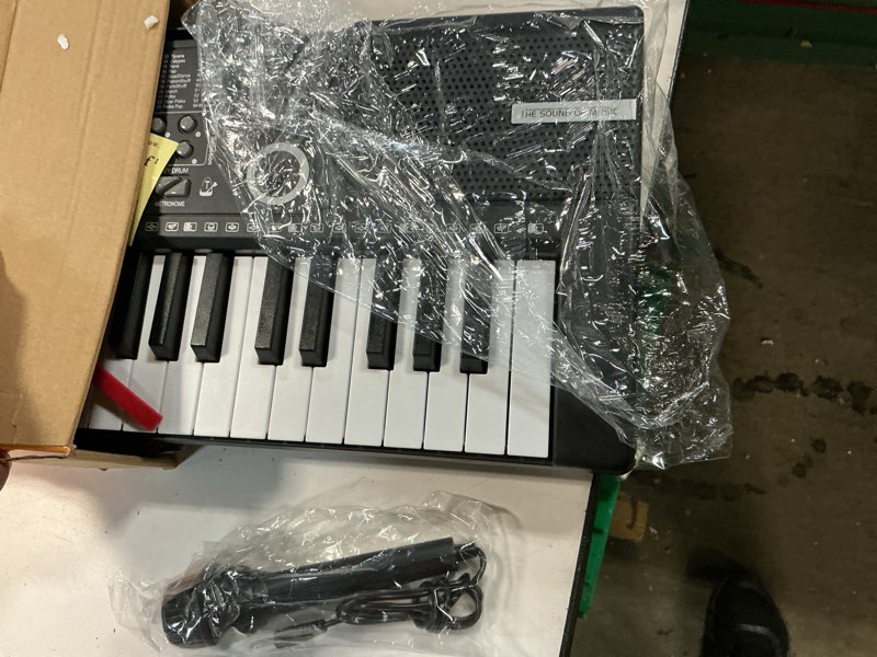 Condition photo showing Good Condition for 61 keys keyboard piano, electronic digital piano with built-in speaker microphone, sheet stand and power supply, portable piano keyboard gift teaching for beginners black