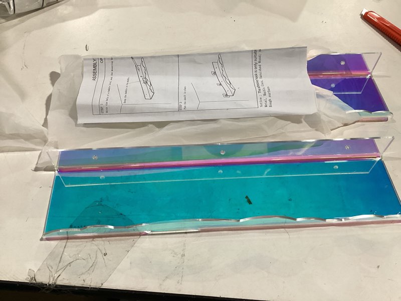 Condition photo showing Good Condition for Iridescent Rainbow Acrylic Floating Shelves,15in Kids Wall Mounted Nursery Bookshelves, Display Ledge for Books Toys Cosmetic, Bathroom Bedroom Living Room Wall Decor and Storage, 2 Pack 40cm, 2 Pack Iridescent