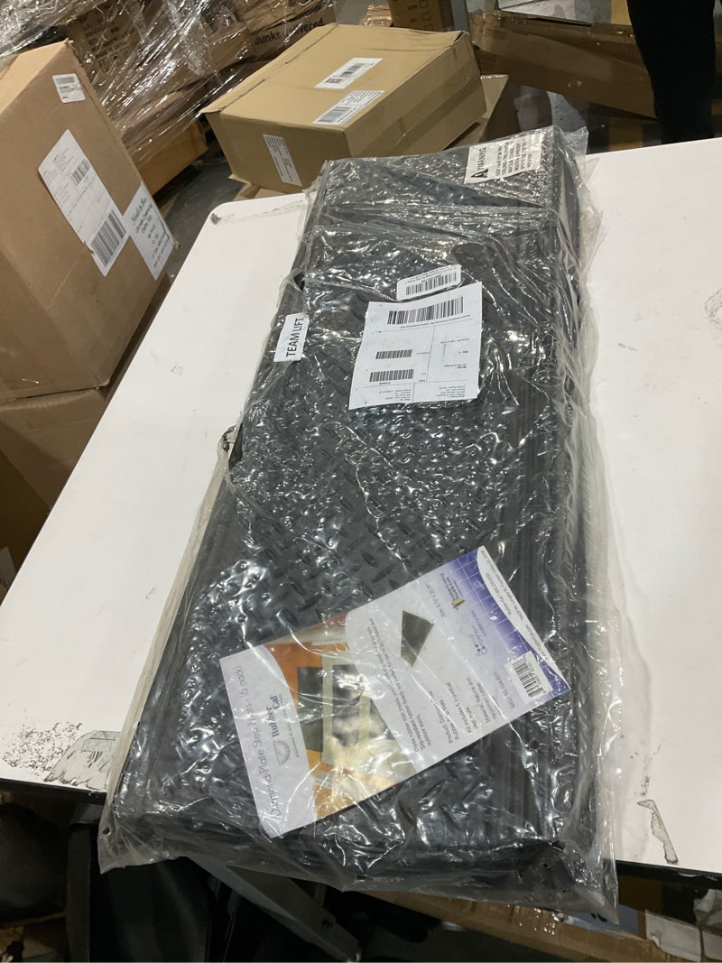 Condition photo showing Good Condition for Rubber-Cal "Diamond-Plate Non-Slip Rubber Tread Stair Mats (6 Pack), Black, 9.75" X 29.75" Industrial