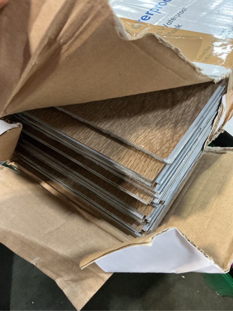 Condition photo showing Good Condition for style selections brown 6-in wide x 4-2/5-mm thick waterproof interlocking luxury vinyl plank flooring (22.17-sq ft)