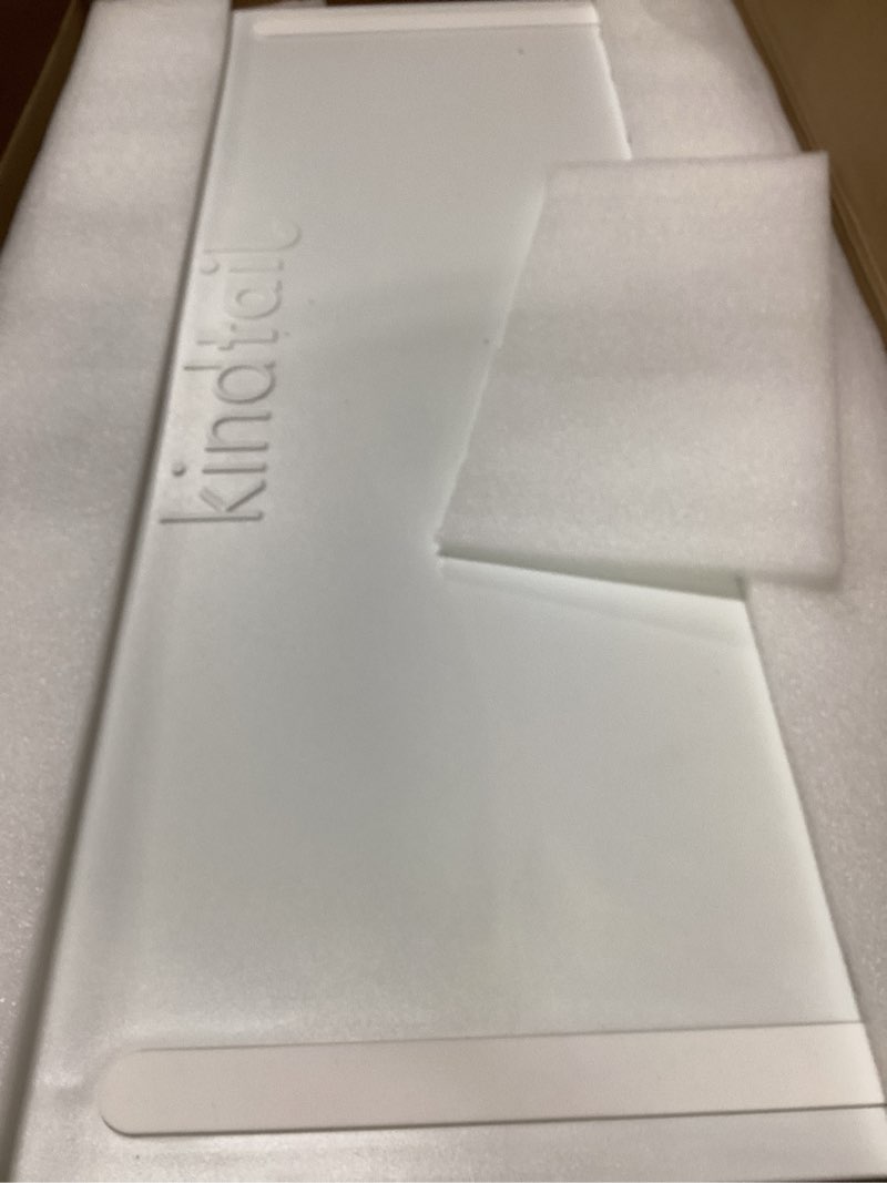 Condition photo showing New/Like New for KindTail Pee PAWD - Holds Standard 24" x 24" Potty Pads - Leakproof Tray with Non-Slip Bottom, 1.5" Raised Edge & Modular Side Panel - Easy-to-Clean Plastic - Foldable Design - Handle for Travel White