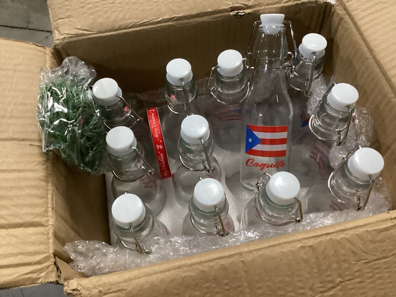 Condition photo showing Good Condition for Sieral 12 Pack Christmas Tree Swing Top Glass Bottle 8oz Clear Flip Top Beer Brewing Bottles with Ribbon and Artificial Branches for Liquids Wine Christmas Xmas Gifts