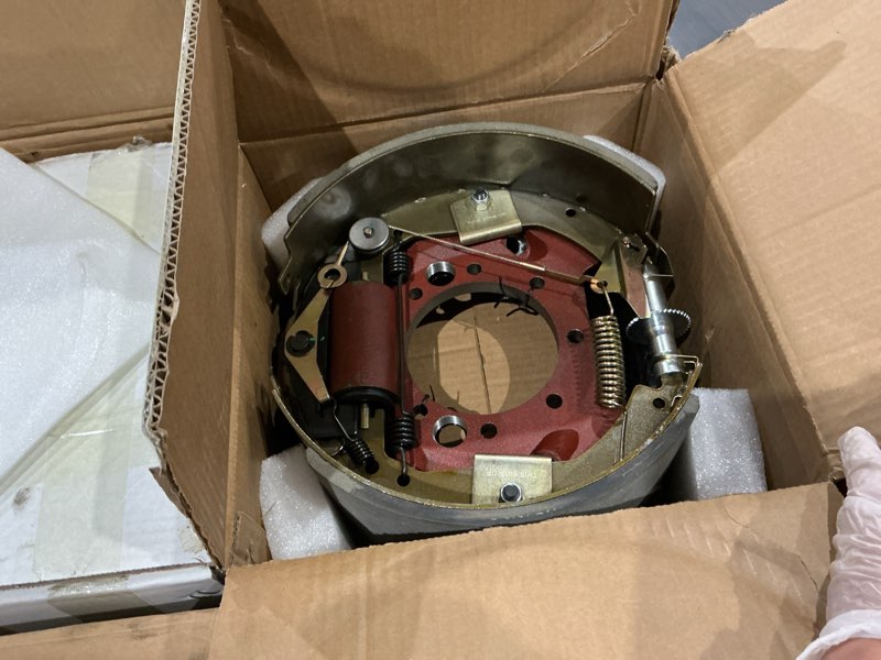 Condition photo showing As Is for 12-1/4" x 5" (12.25" x 5") electric trailer brake assembly pair for 12,000 lbs (12k) trailer axles left and right electric trailer brakes